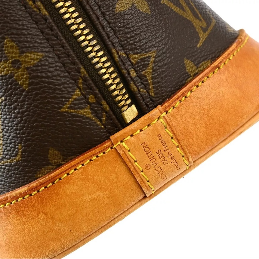 Authentic Louis Vuitton Alma Monogram Handbag - Picture 7 of 9